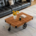 Tavolino da Caffè Grande Rustico Vintage Industriale in Legno con Venature Dettagliate, Accenti in Metallo e Ruote Nere in Ghisa da Carrello
